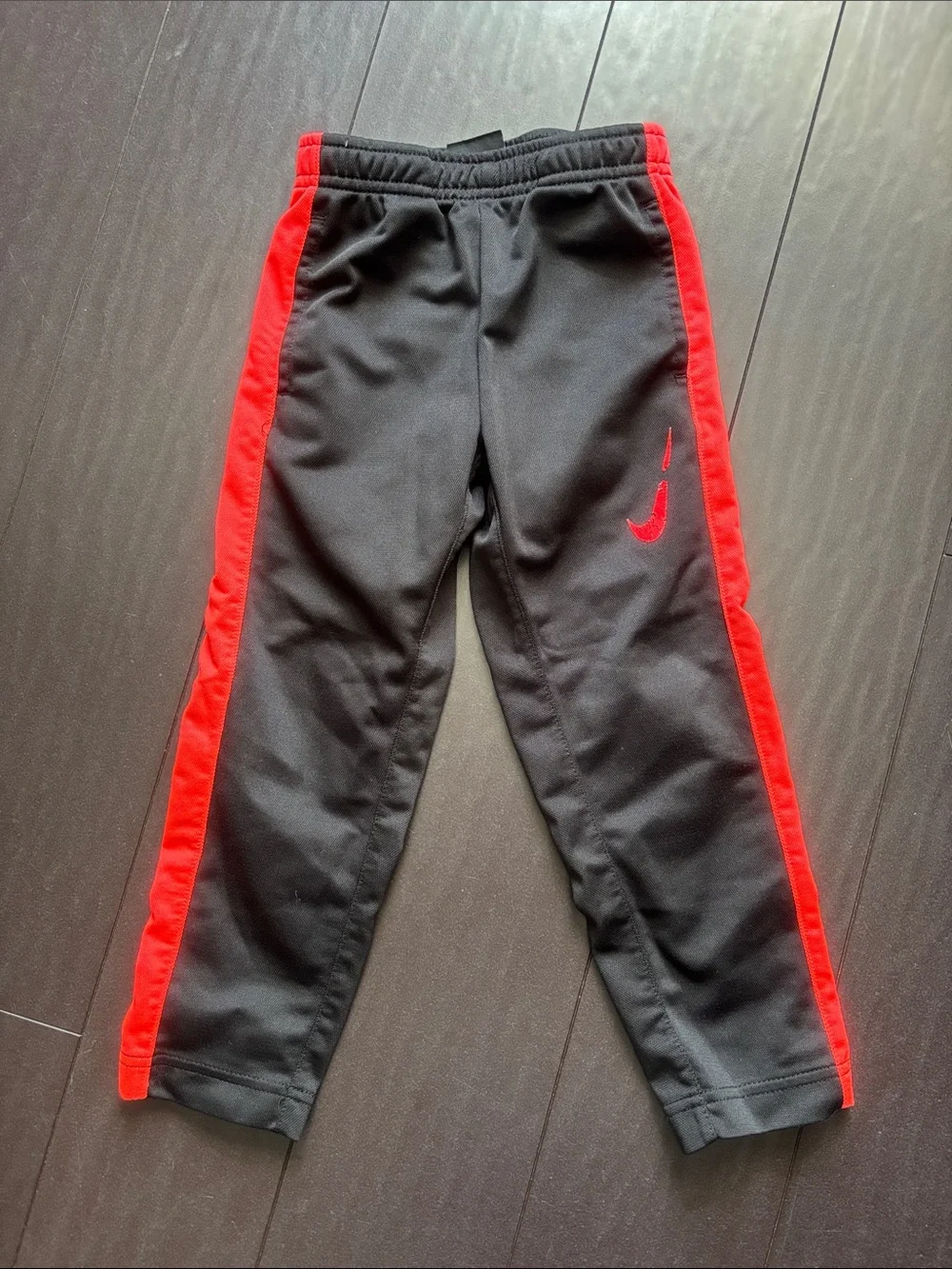 Nike Black Joggers with Red Side Stripes - Kids